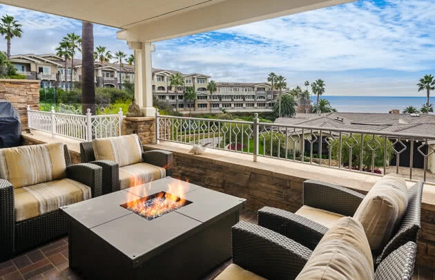 Laguna Beach Residence, outdoor area with seating and fireplace