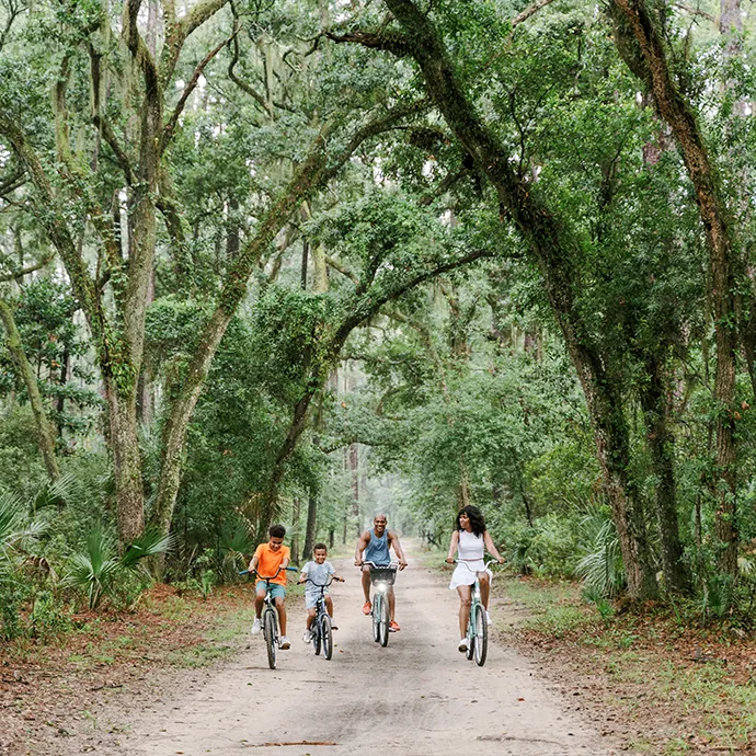 Family biking in Montage Palmetto Bluff