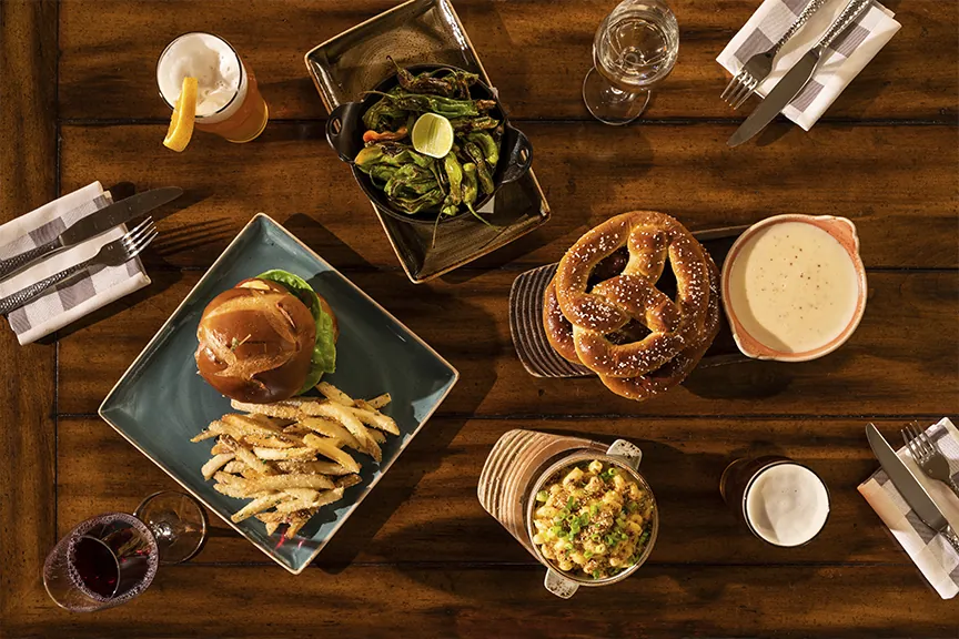 Various plates of food on a table at Beartooth Pub and Rec