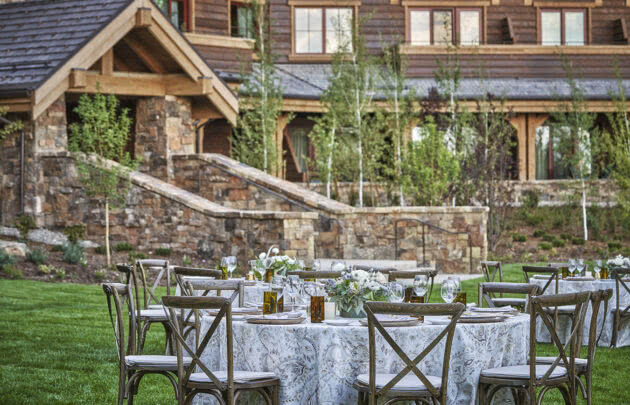 A table set up on the grand lawn at Montage Big Sky