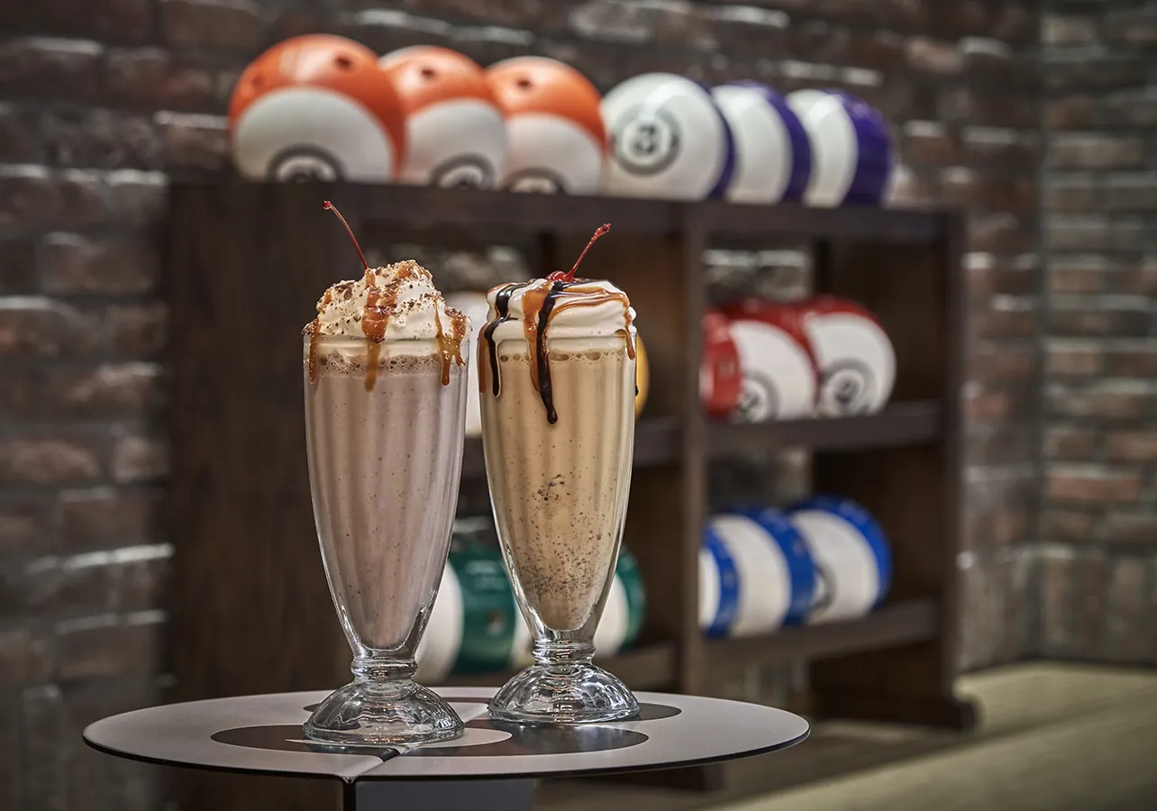 Milkshakes sitting on a table at Beartooth Pub