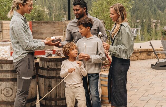 A family enjoying s'mores at Montage Big Sky.