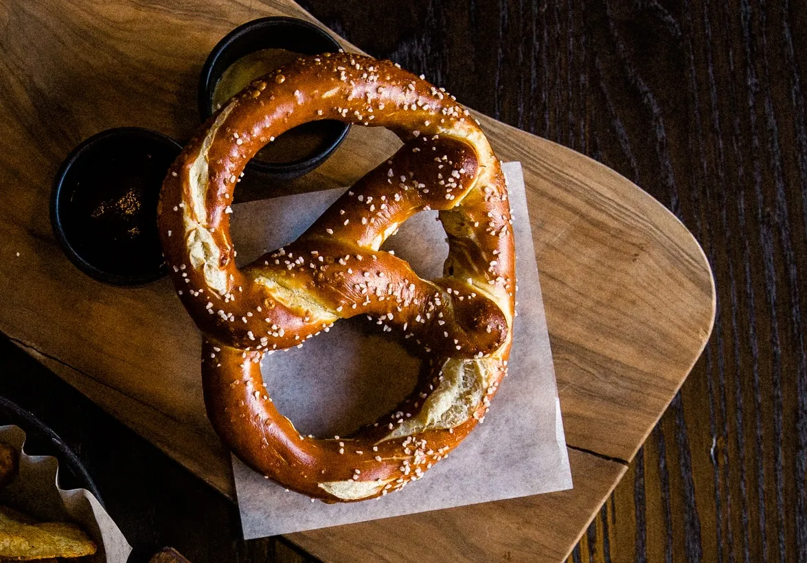 Pretzel with salt, on a table