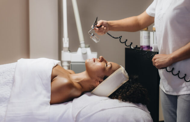 A woman getting a facial steam