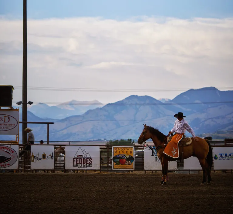 A person on a horse at Big Sky rodeo