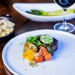 3 course meal on table with wine