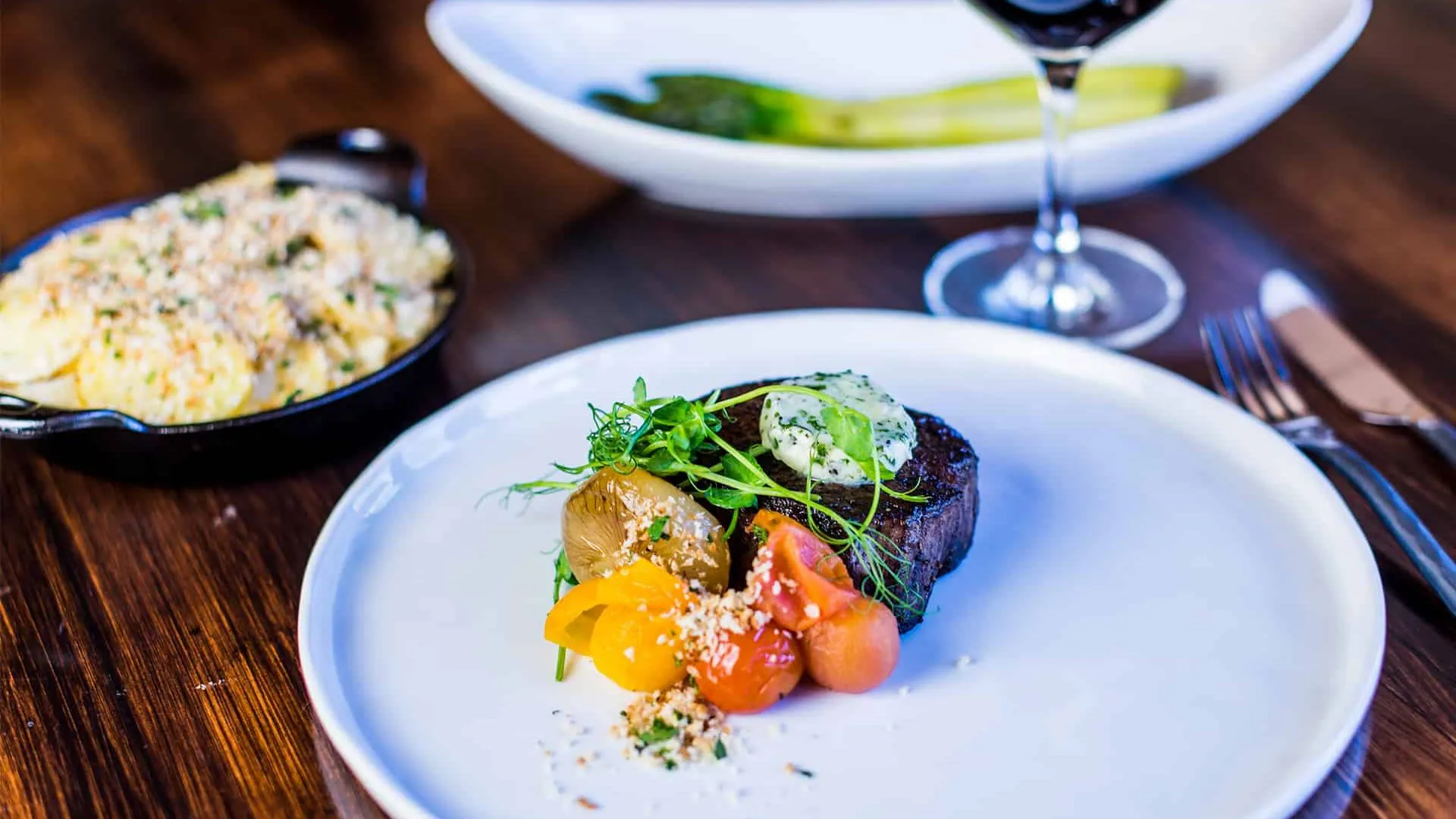 3 course meal on table with wine