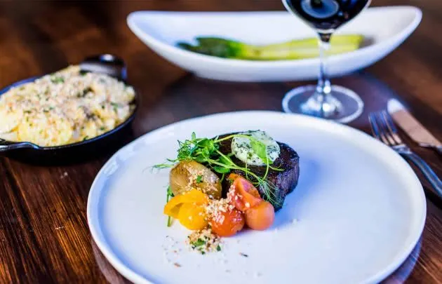 3 course meal on table with wine
