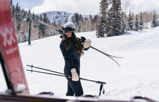 Woman with skis at Montage Deer Valley