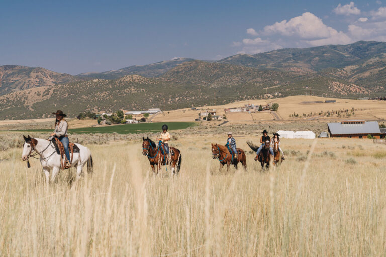 A family riding horses in Deer Valley