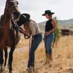 two women and a horse