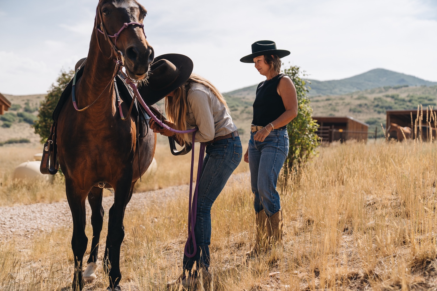 two women and a horse