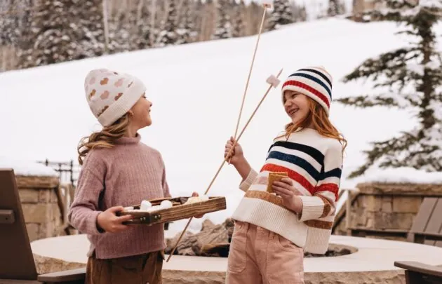 Young girls with ingredients for s'mores