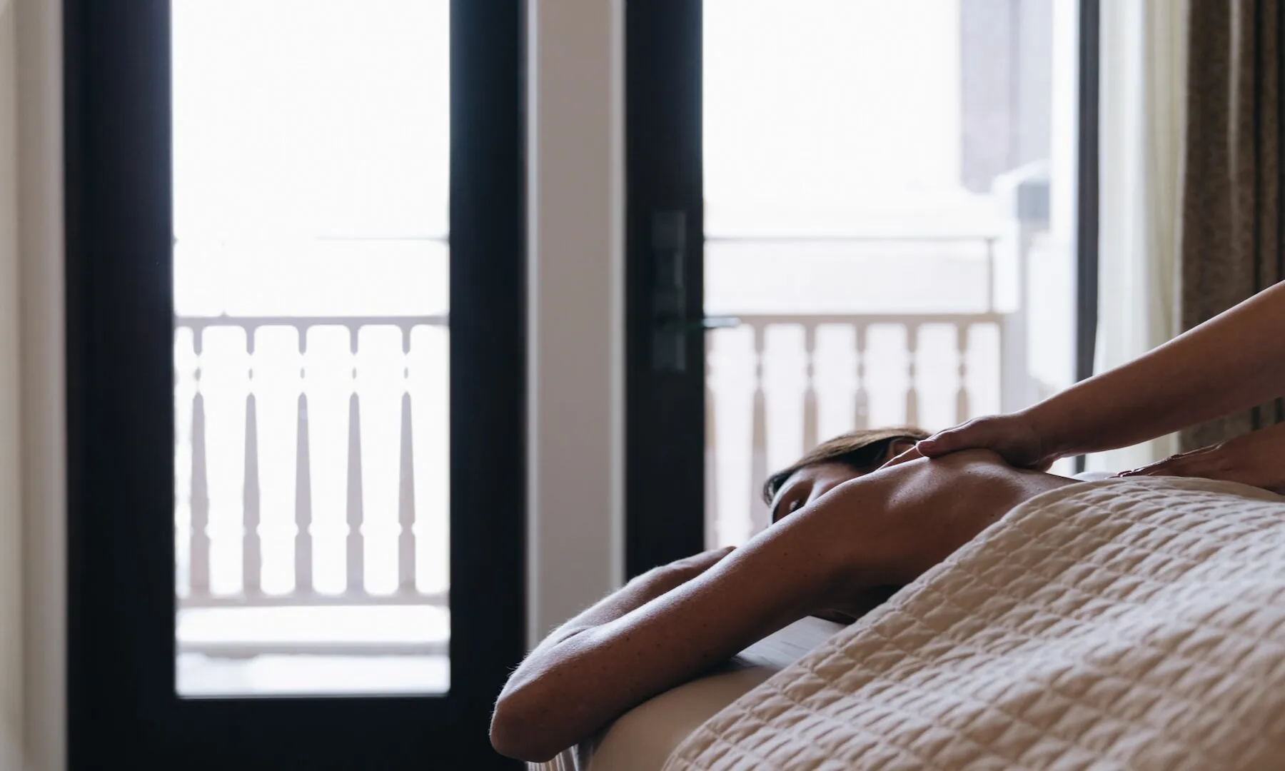 A woman receiving a massage.