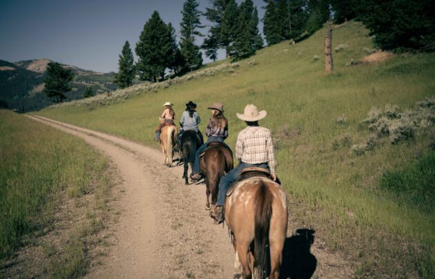 Friends riding horses in Deer Valley