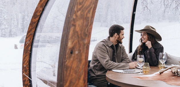 A couple having dinner at Apex