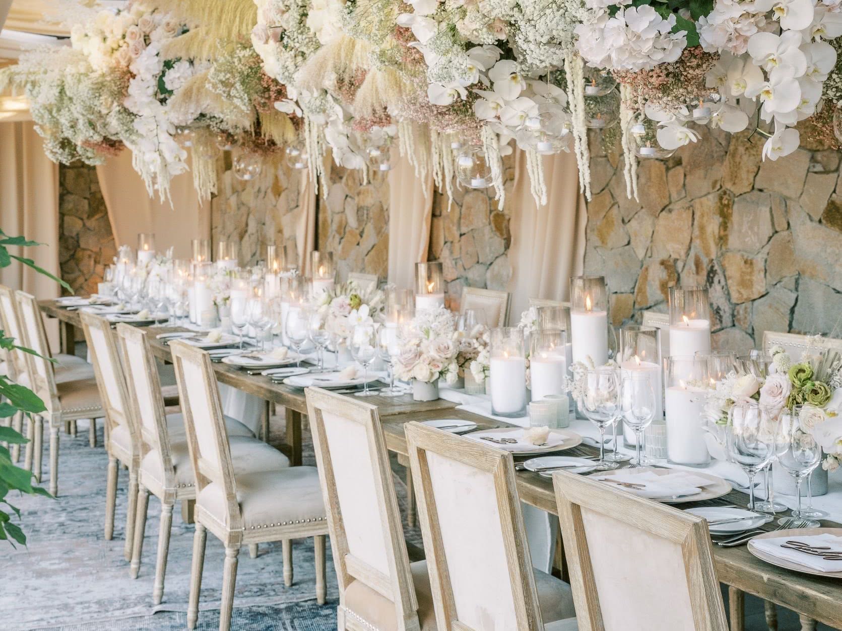 tables decorated with flowers and white table cloth