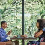 Couple dining at Hazel Hill restaurant at luxury sonoma resort, Montage Healdsburg