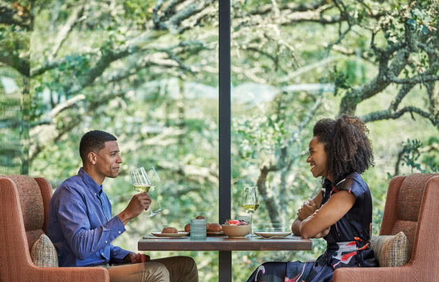 Couple dining at Hazel Hill restaurant at luxury sonoma resort, Montage Healdsburg