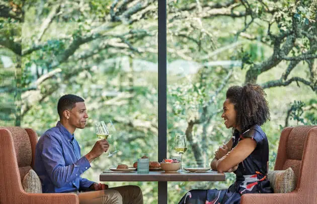 Couple dining at Hazel Hill restaurant at luxury sonoma resort, Montage Healdsburg