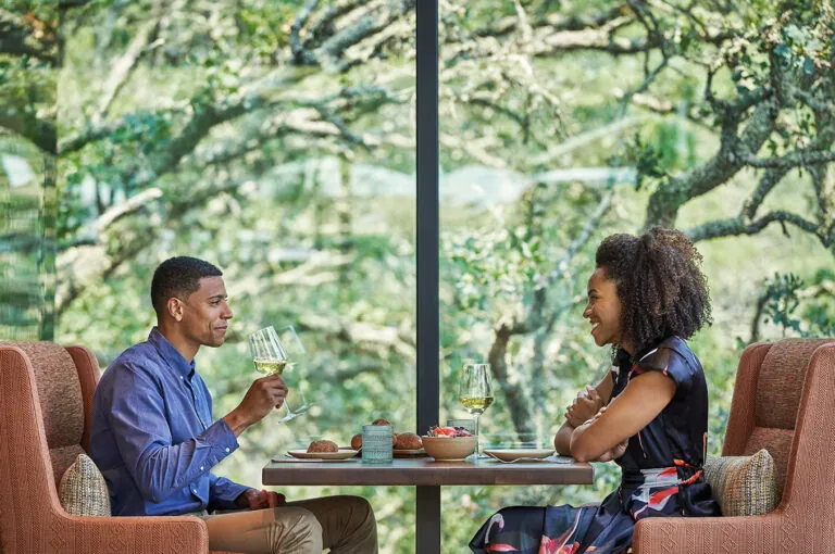 Couple dining at Hazel Hill restaurant at luxury sonoma resort, Montage Healdsburg