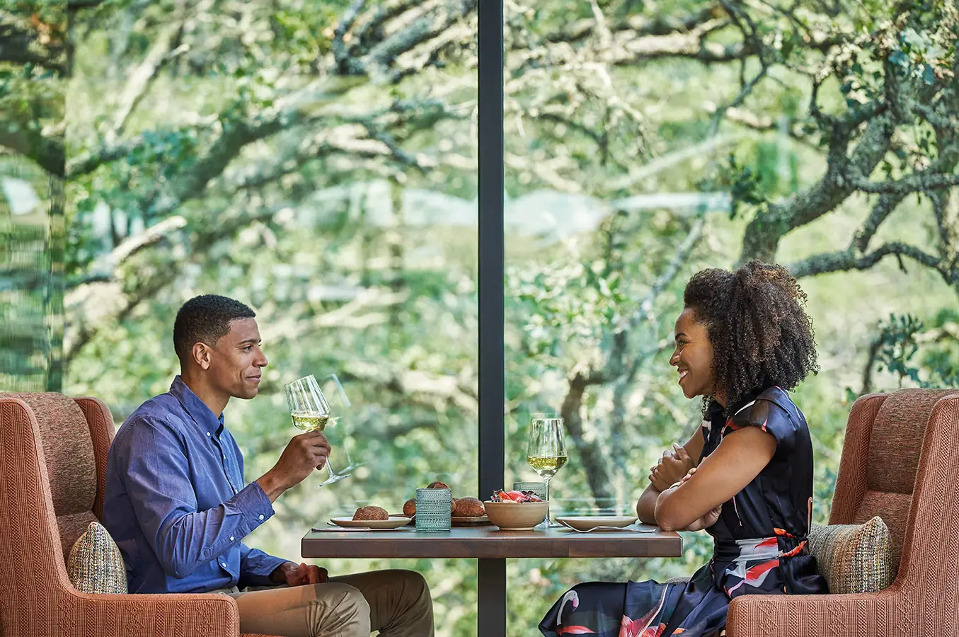 Couple dining at Hazel Hill restaurant at luxury sonoma resort, Montage Healdsburg