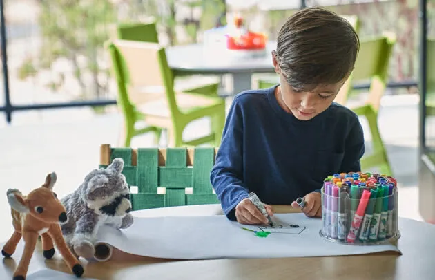 Child drawing at Paintbox, luxury healdsburg hotel Montage Healdsburg's children program