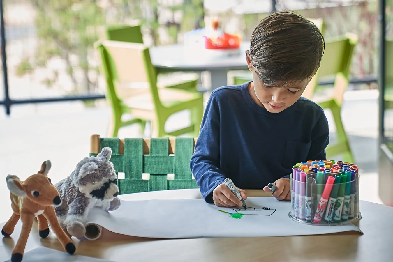 Child drawing at Paintbox, luxury healdsburg hotel Montage Healdsburg's children program