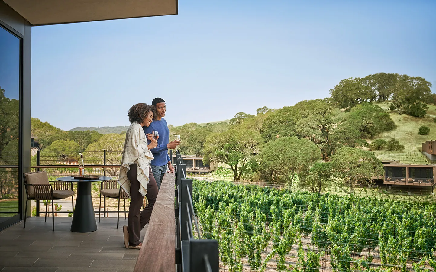 Couple looking out at napa valley vineyards at Montage Healdsburg resort