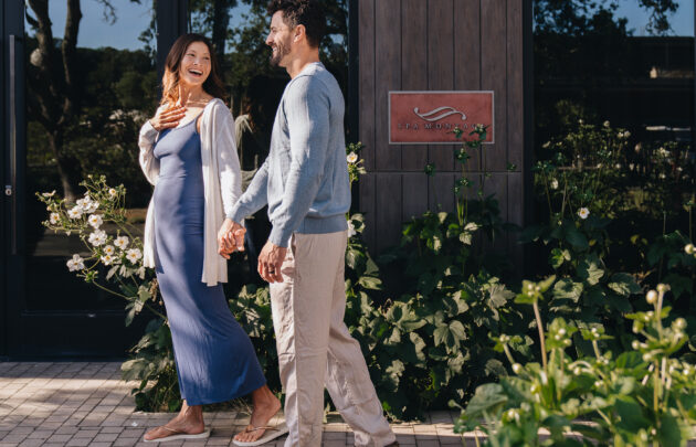 Couple walking in front of Spa Montage building.