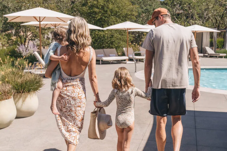 Family walking to the family pool area.