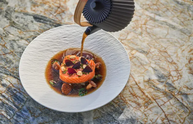 Salmon dish on plate on table