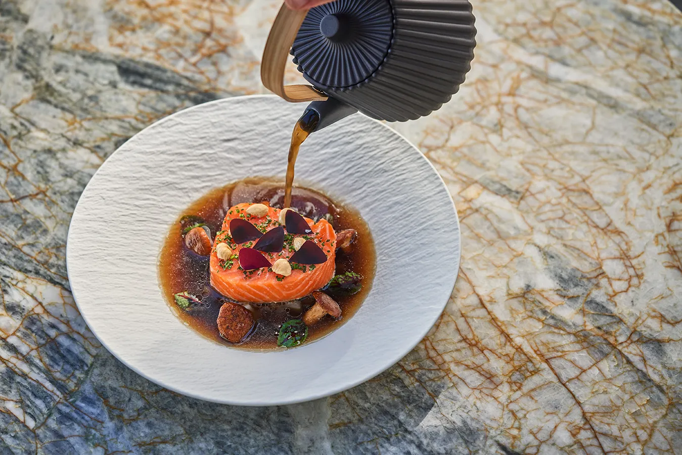 Salmon dish on plate on table