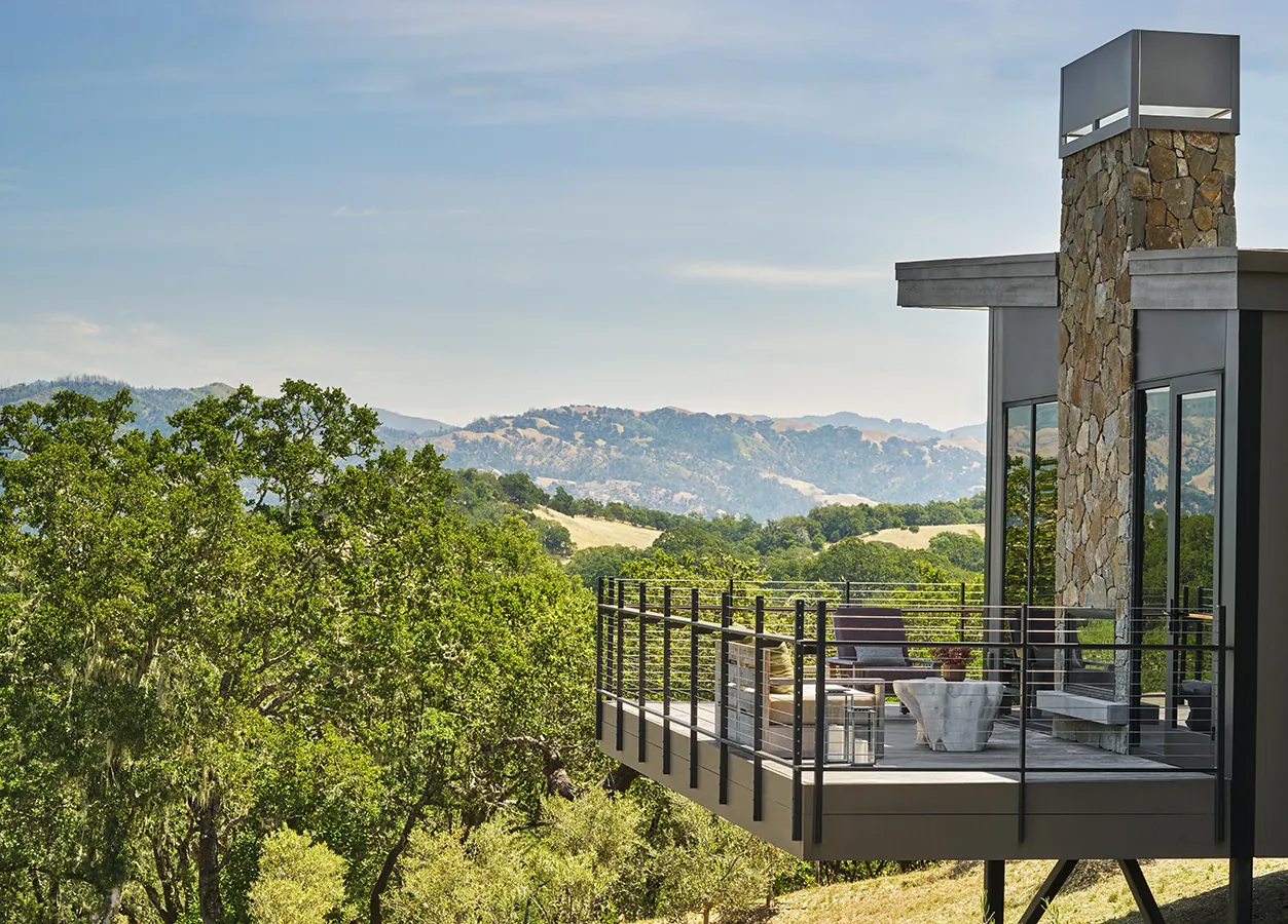 Balcony overlooking greenery at the Guest House