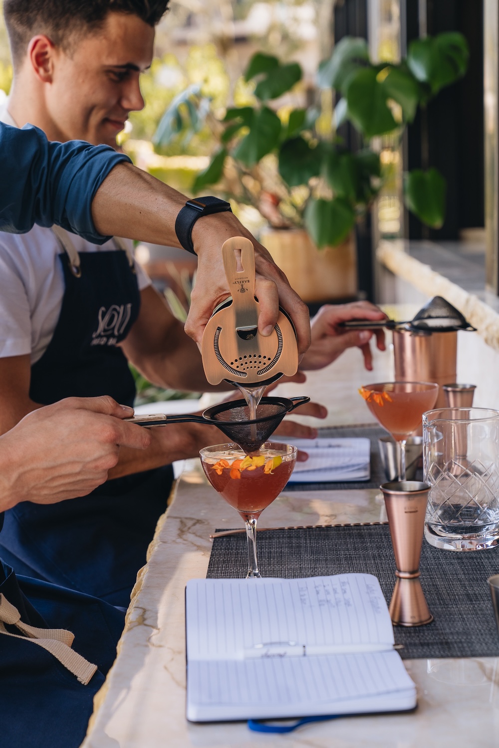 bartended making a cocktail