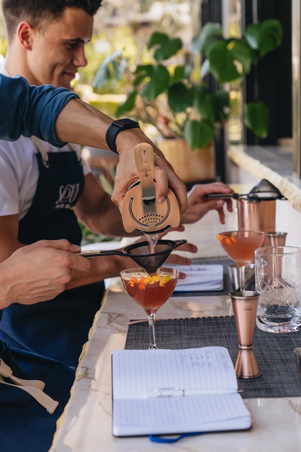 bartended making a cocktail
