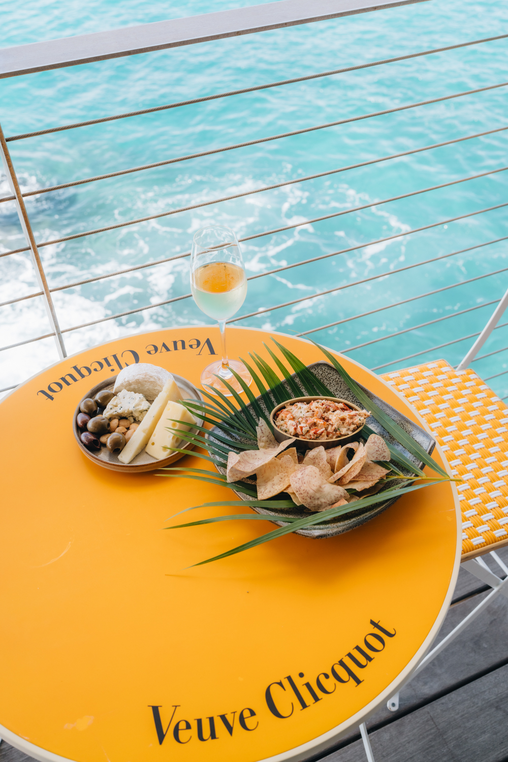 dining options on yellow table at chamgagne hale at cliff house overlooking the pacific