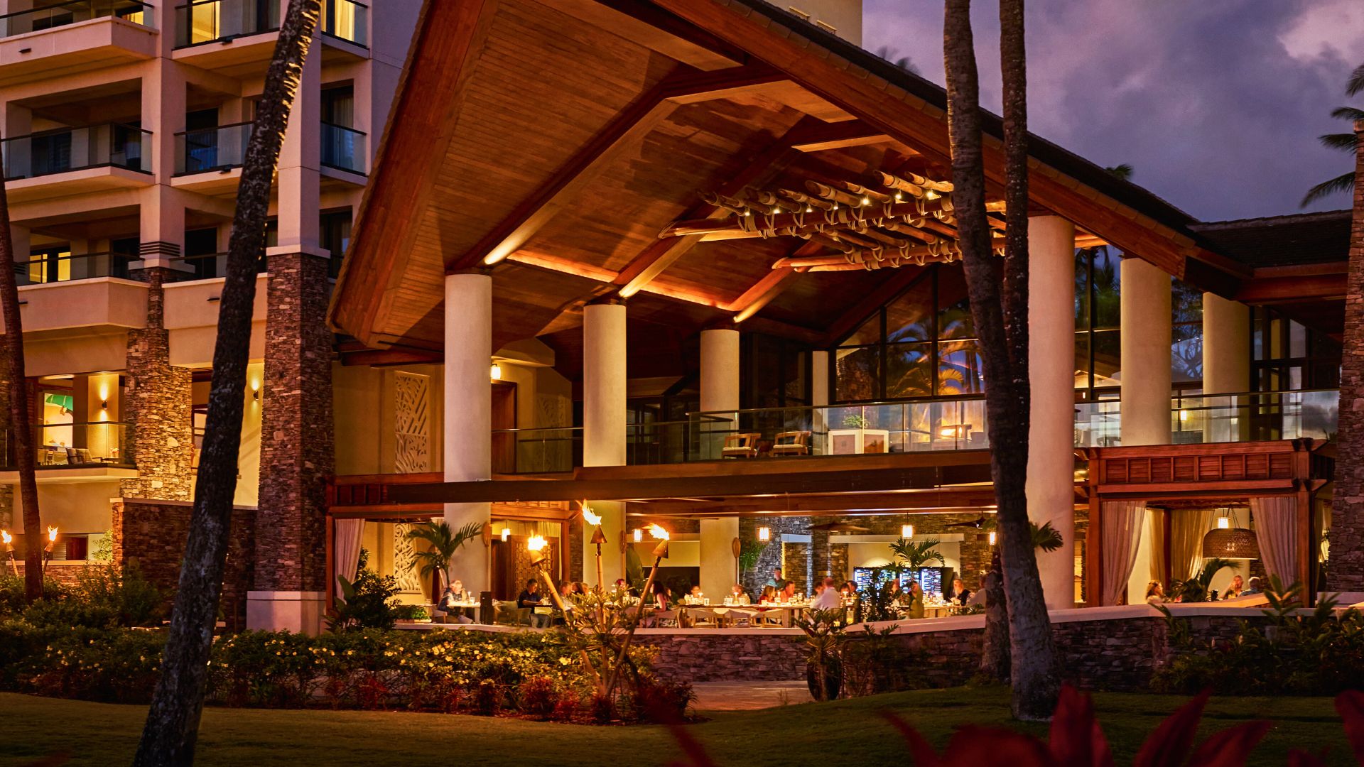 Cane & Canoe exterior at twilight.