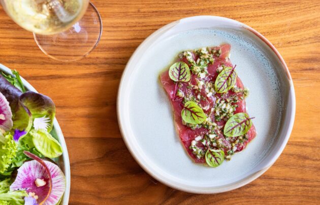 Tablescape of dishes in Cane & Canoe.