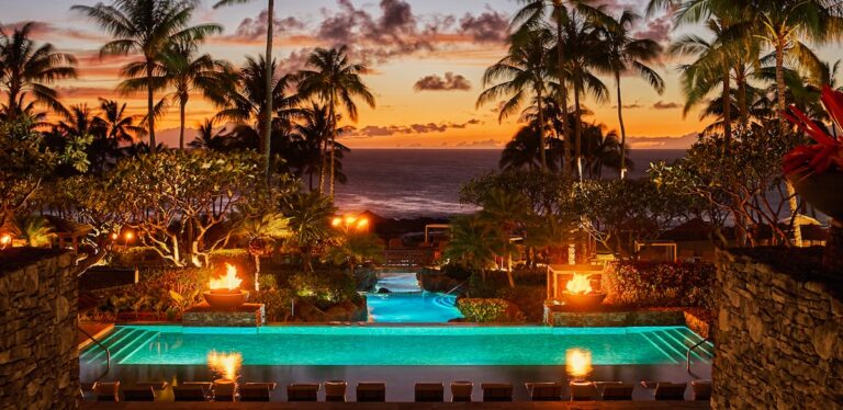 Resort pool at sunset