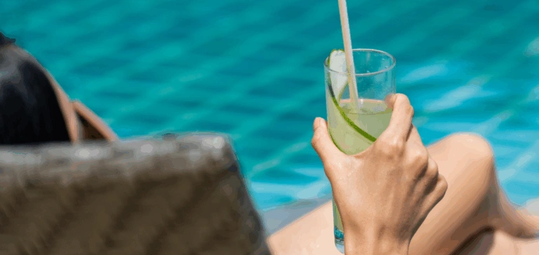 Woman Holding Green Cocktail