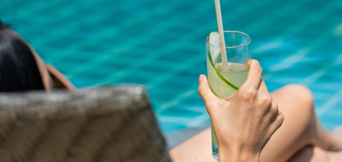 Woman Holding Green Cocktail
