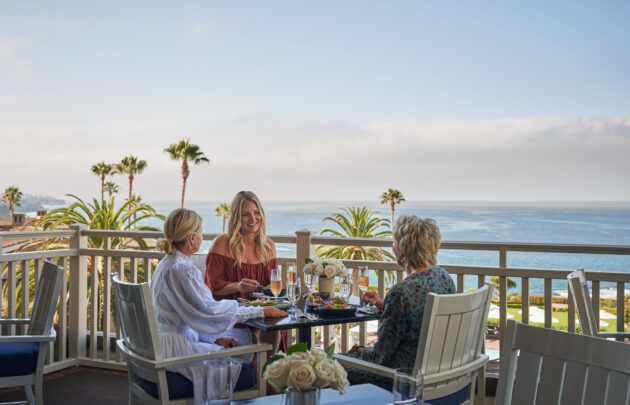 Ladies eating lunch on patio at The Loft
