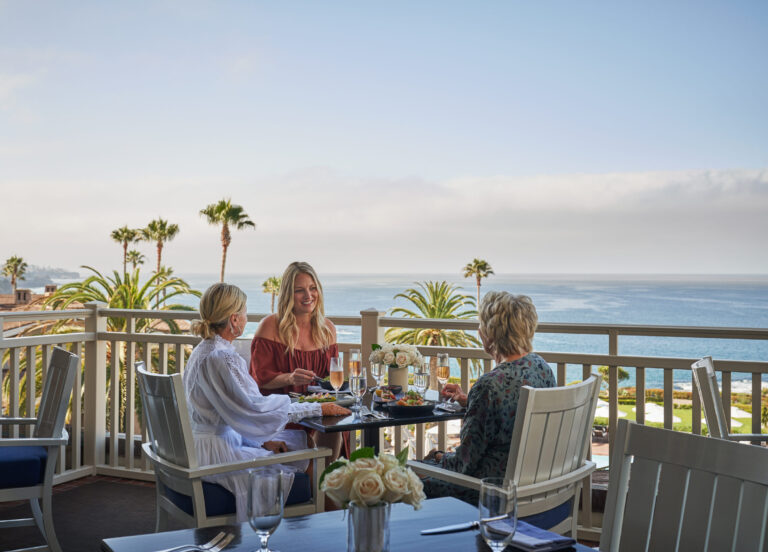 Ladies eating lunch on patio at The Loft