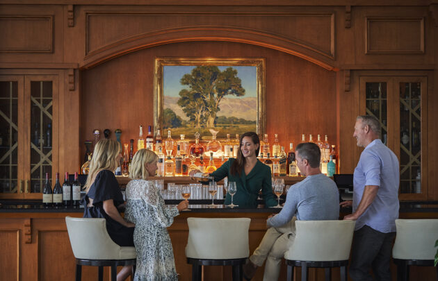 Friends enjoying wine at the Lobby Lounge bar