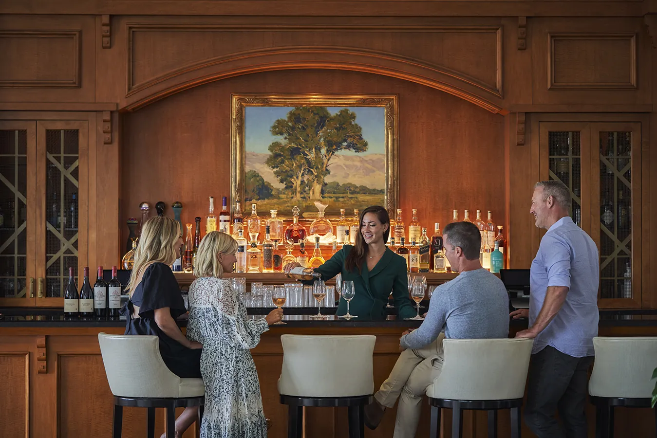 Friends enjoying wine at the Lobby Lounge bar