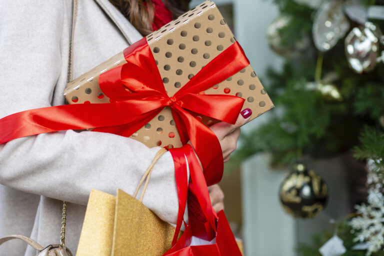 Holiday Gift by the Christmas Tree