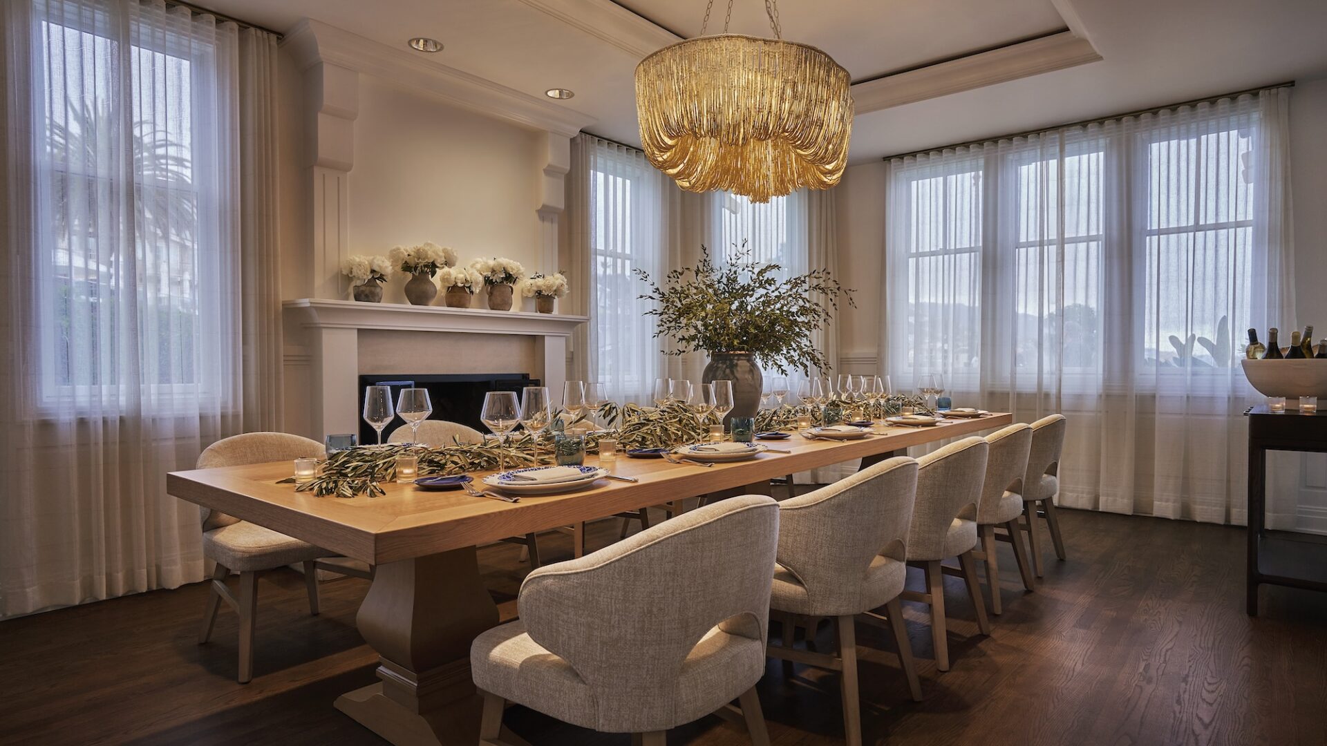table set with glasses and flowers