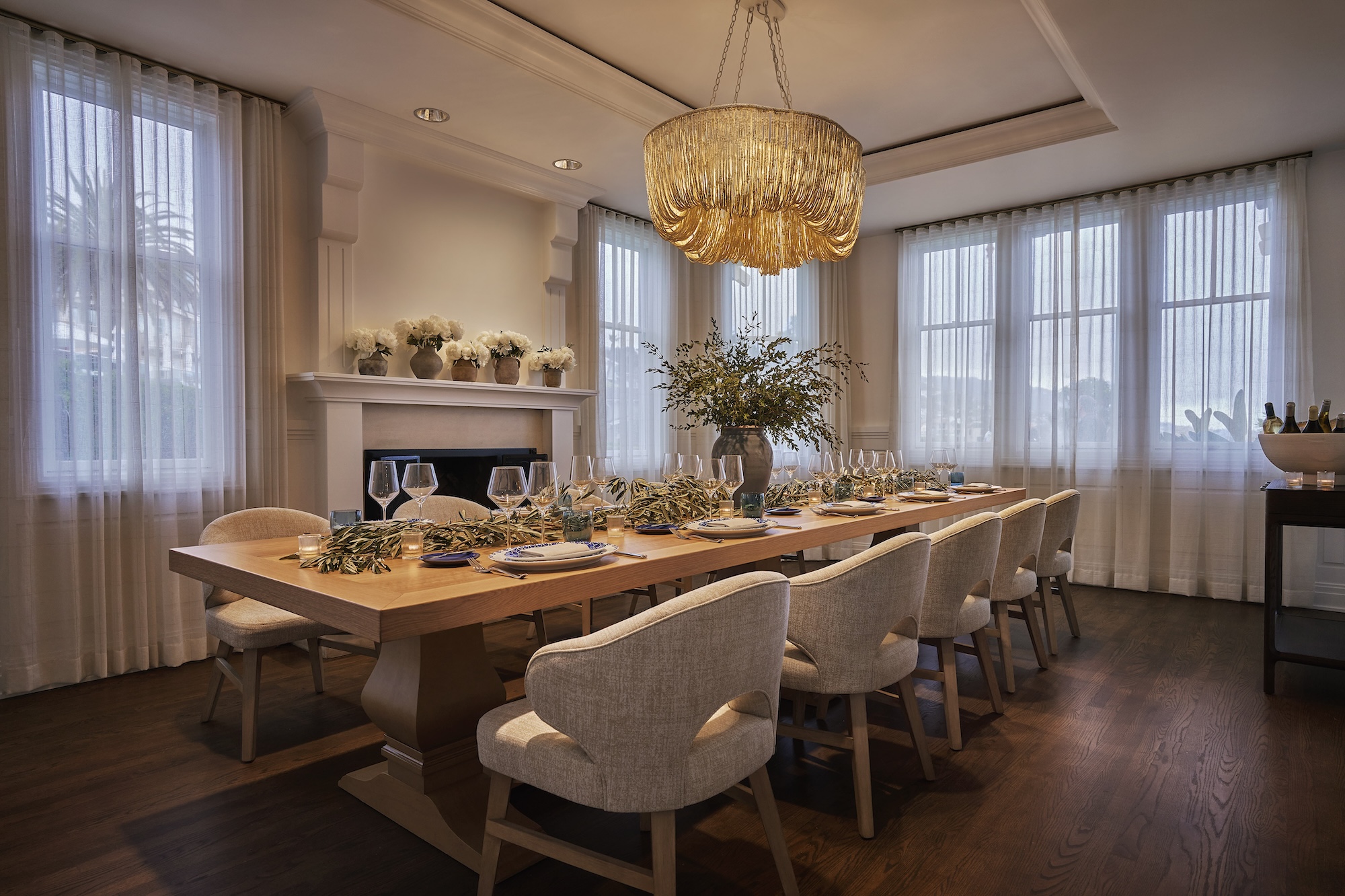 table set with glasses and flowers