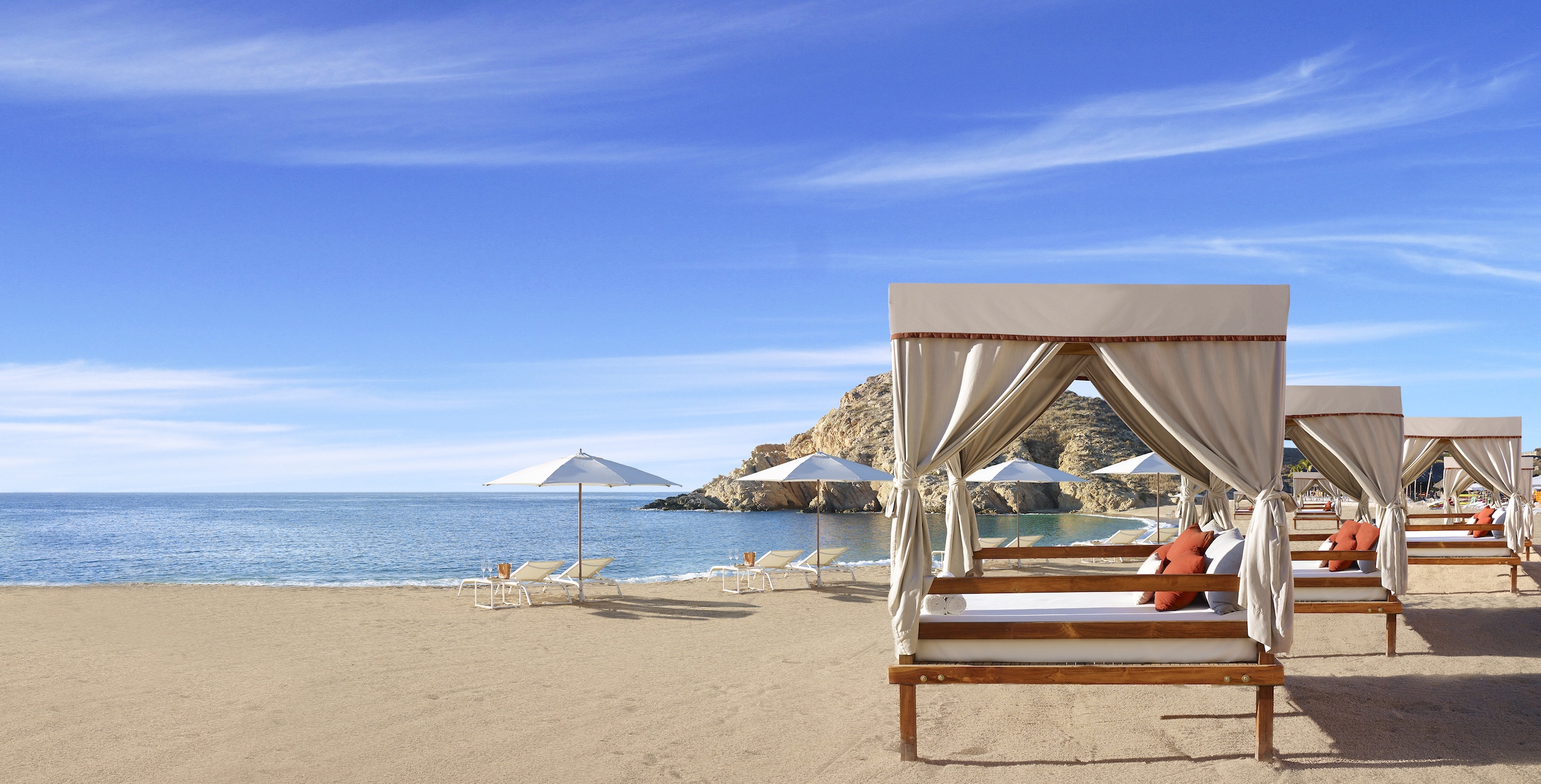 Beach cabanas on the sand of Santa Maria Bay